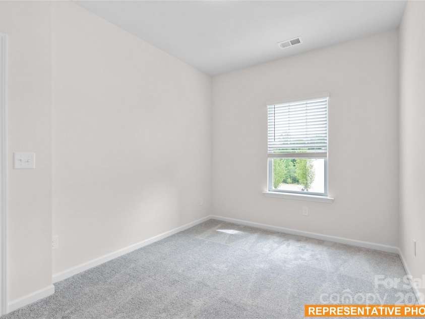 6029 Jasmine Branch Road, Charlotte, NC 28216.  MLS# CAR4241067, YatesRealty ID 11849. Suwanee - Secondary Bedroom 1