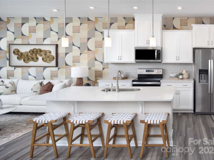 2455 Hedgecliff Road, Kannapolis, NC 28025.  MLS# CAR4255198, YatesRealty ID 11852. Kitchen-Adriana Decorated Model Home-like subject property