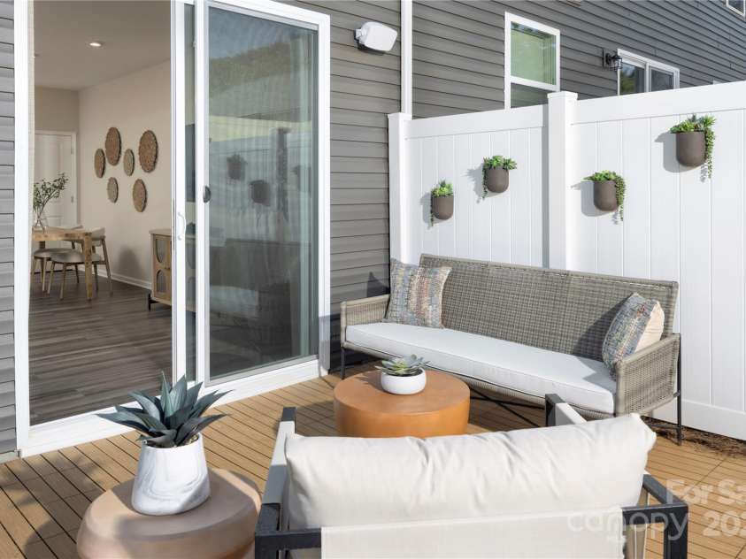 2455 Hedgecliff Road, Kannapolis, NC 28025.  MLS# CAR4255198, YatesRealty ID 11852. Patio with 2 Privacy Partitions-Adriana Decorated Model Home-like subject property