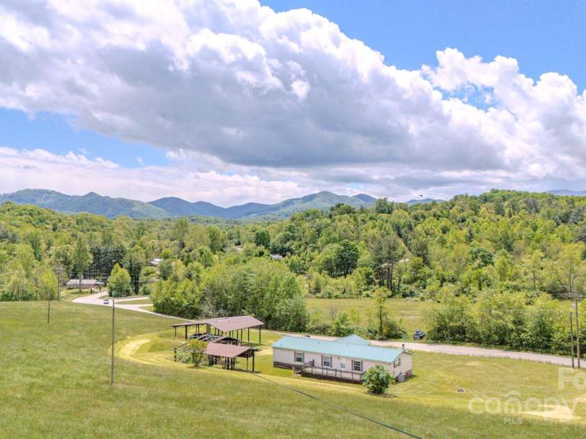 22 Hominy Baptist Church Road, Candler, NC 28715.  MLS# CAR4255118, YatesRealty ID 11853. Cleared level acreage