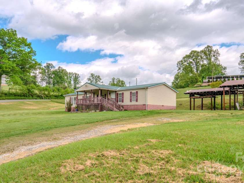 22 Hominy Baptist Church Road, Candler, NC 28715.  MLS# CAR4255118, YatesRealty ID 11853. Welcome Home!