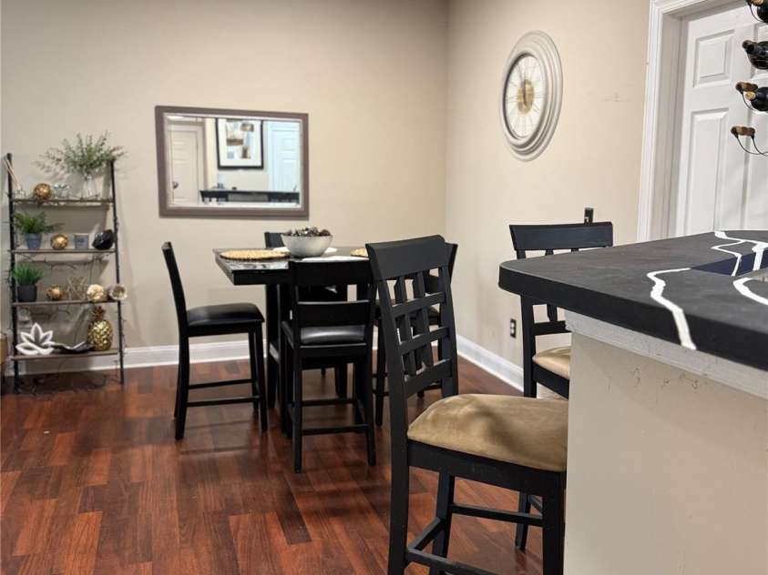 6730 Mallard Park Drive, Charlotte, NC 28262.  MLS# CAR4329944, YatesRealty ID 11855. Spacious open floor plan with bar area