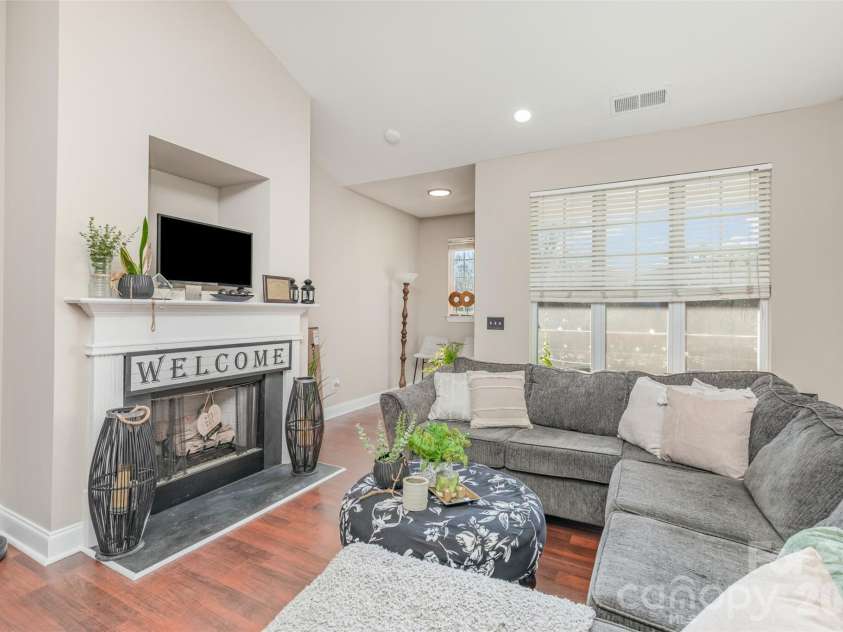 6730 Mallard Park Drive, Charlotte, NC 28262.  MLS# CAR4329944, YatesRealty ID 11855. View of fireplace and patio.