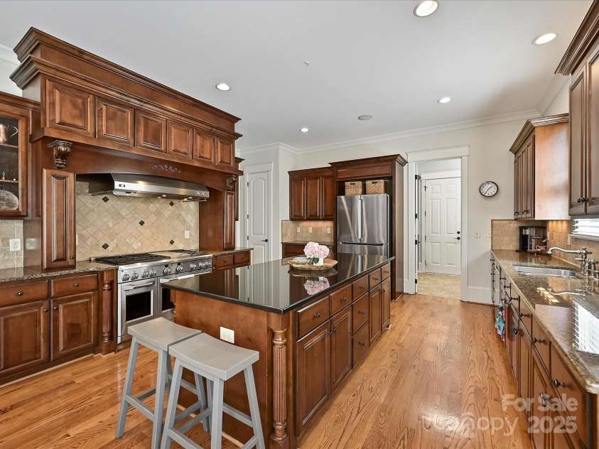 7208 Ashton Gate Drive, Charlotte, NC 28270.  MLS# CAR4246085, YatesRealty ID 11858. Kitchen with View to Laundry Room/Scullery