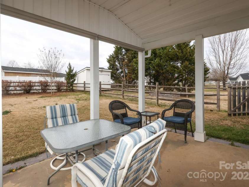 2003 Hemby Commons Parkway, Indian Trail, NC 28079.  MLS# CAR4230875, YatesRealty ID 11859. Covered patio
