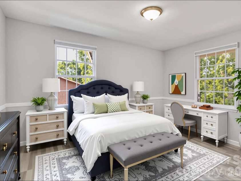 3637 Glenville Avenue, Charlotte, NC 28215.  MLS# CAR4382722, YatesRealty ID 11859. Walking into primary bedroom (virtually staged & enhanced).