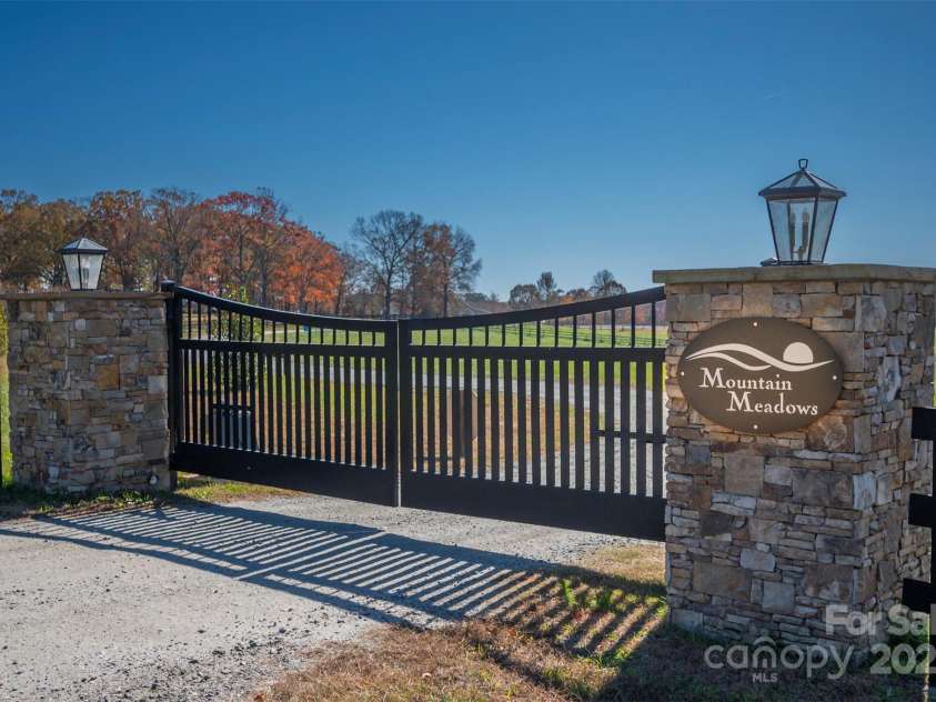 297 Mountain Meadows Lane, Tryon, NC 28782.  MLS# CAR4322255, YatesRealty ID 1186. 