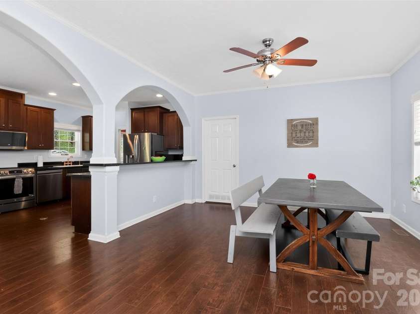 155 Amity Church Road, Iron Station, NC 28080.  MLS# CAR4367881, YatesRealty ID 11862. Dining Kitchen Open