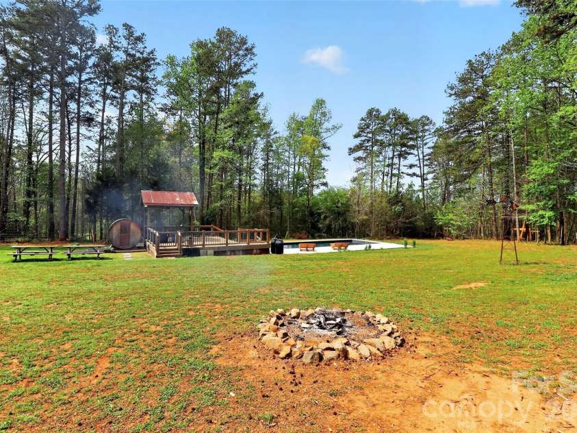 155 Amity Church Road, Iron Station, NC 28080.  MLS# CAR4367881, YatesRealty ID 11862. Natural Fire Pit