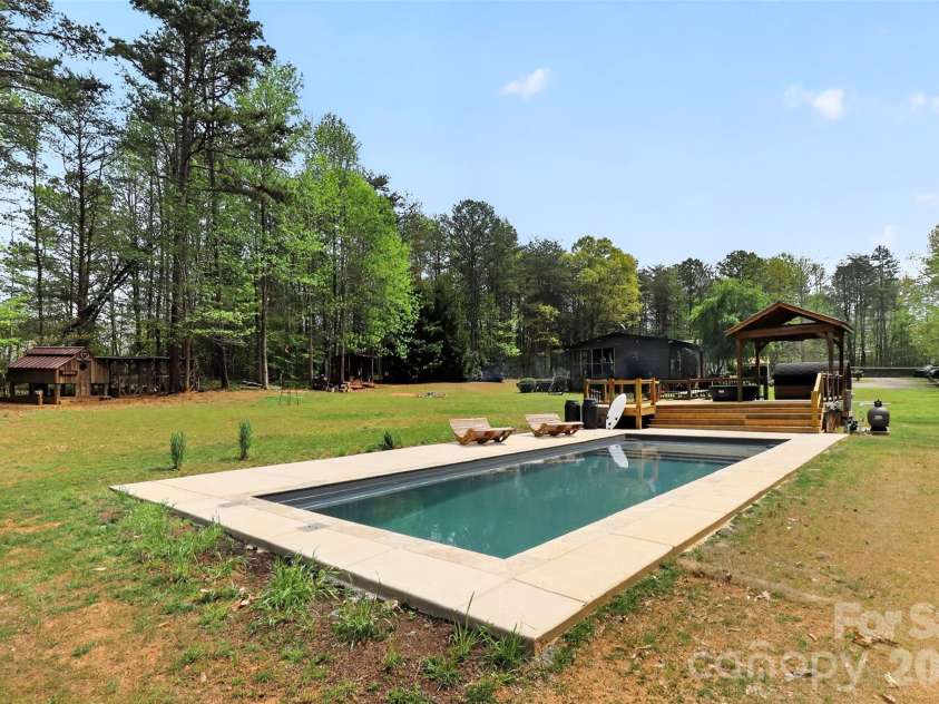 155 Amity Church Road, Iron Station, NC 28080.  MLS# CAR4367881, YatesRealty ID 11862. Pool