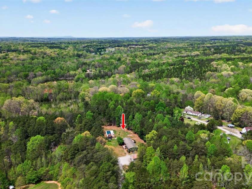 155 Amity Church Road, Iron Station, NC 28080.  MLS# CAR4367881, YatesRealty ID 11862. Surrounded by Trees