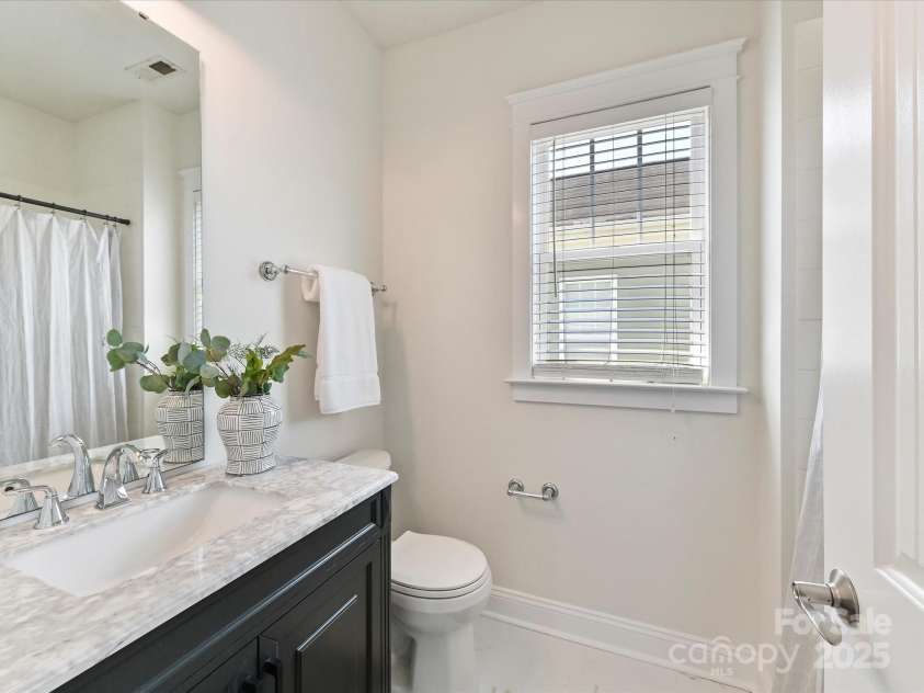 1904 Lela Avenue, Charlotte, NC 28208.  MLS# CAR4241700, YatesRealty ID 11864. Guest Room Ensuite Full Bath