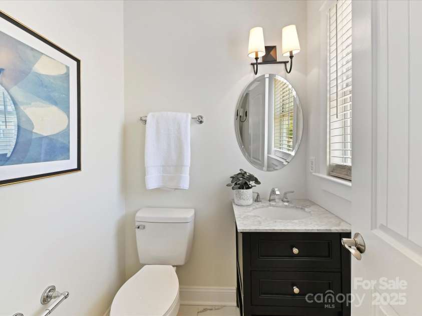 1904 Lela Avenue, Charlotte, NC 28208.  MLS# CAR4241700, YatesRealty ID 11864. Main Level Powder Room