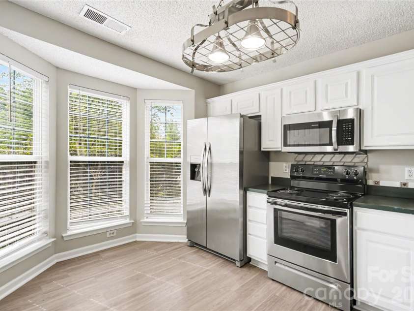 117 Tanninger Road, Mount Holly, NC 28120.  MLS# CAR4369673, YatesRealty ID 11868. Kitchen with breakfast nook