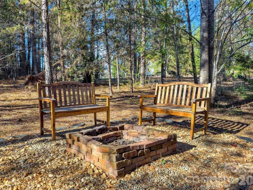 317 Chocolate Drop Circle, Union Mills, NC 28167.  MLS# CAR4337126, YatesRealty ID 1187. Peaceful fire pit area