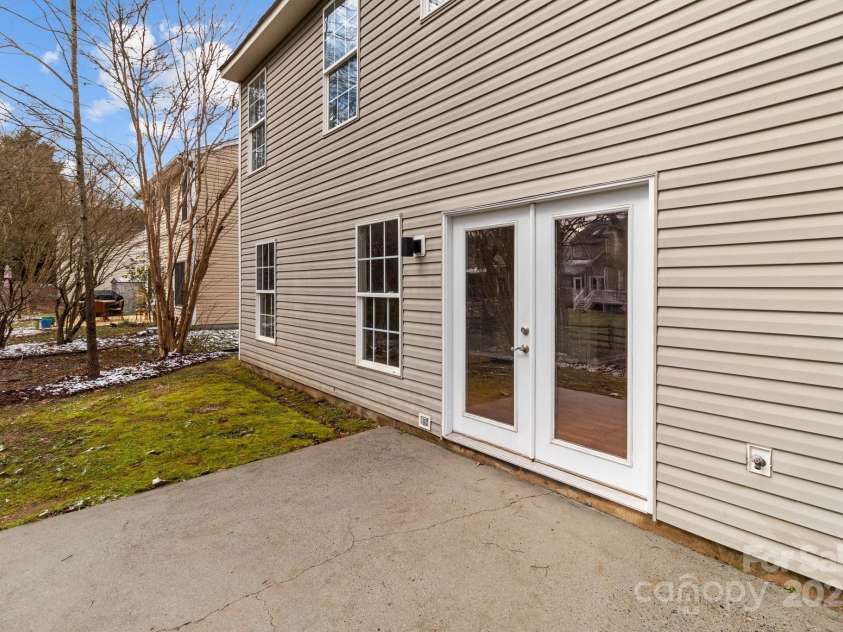 9014 Arbor Creek Drive, Charlotte, NC 28269.  MLS# CAR4225793, YatesRealty ID 1188. Back Exterior