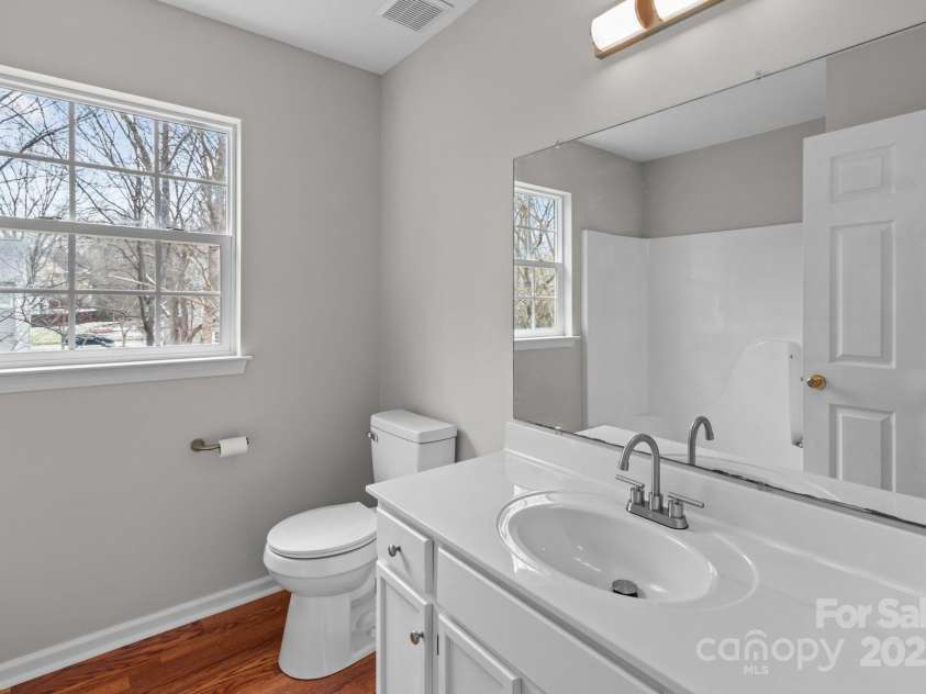 9014 Arbor Creek Drive, Charlotte, NC 28269.  MLS# CAR4225793, YatesRealty ID 1188. Hallway Bathroom