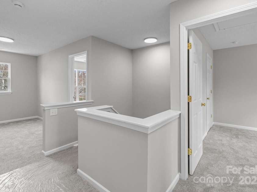 9014 Arbor Creek Drive, Charlotte, NC 28269.  MLS# CAR4225793, YatesRealty ID 1188. Upper loft area