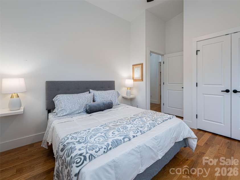 197 Chatham Road, Asheville, NC 28804.  MLS# CAR4290361, YatesRealty ID 11880. Guest Bedroom #1 . Oak Hardwood flooring, double door closet, floating nightstands