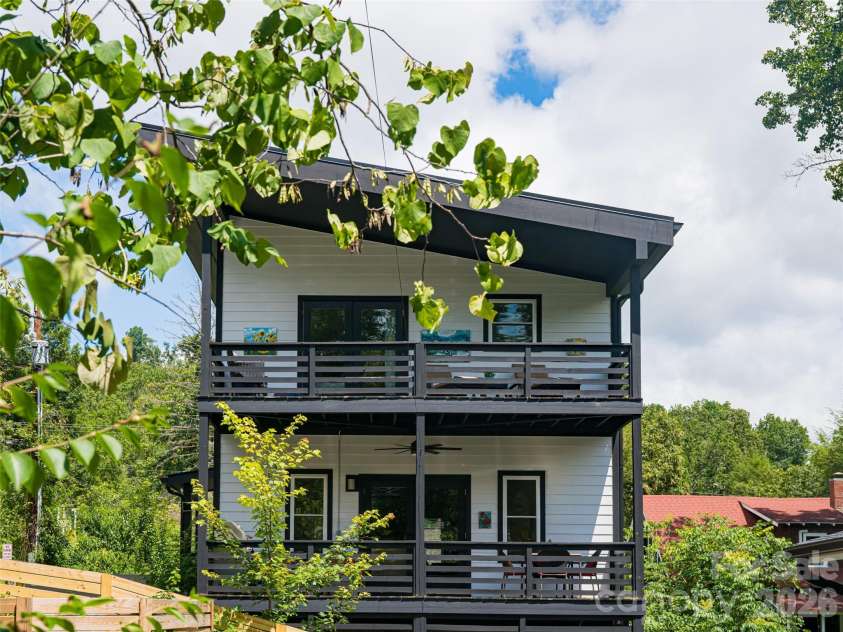 197 Chatham Road, Asheville, NC 28804.  MLS# CAR4290361, YatesRealty ID 11880. Side view of upper and lower decks