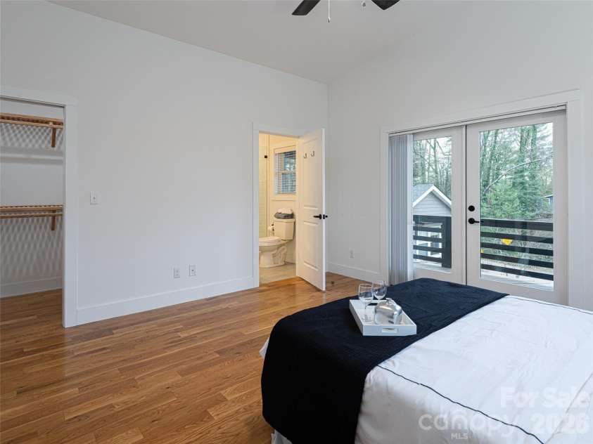 197 Chatham Road, Asheville, NC 28804.  MLS# CAR4290361, YatesRealty ID 11880. Spacious Primary Bedroom with walk-in closet, Primary Bath, Private Deck