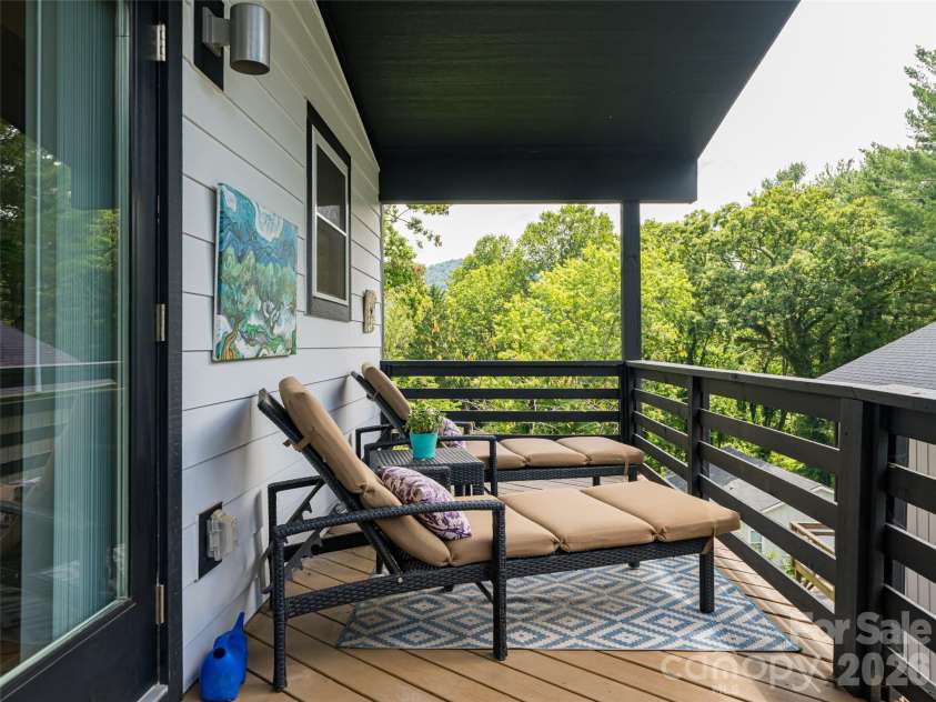197 Chatham Road, Asheville, NC 28804.  MLS# CAR4290361, YatesRealty ID 11880. Third level deck with French Doors. Spacious area for relaxing.