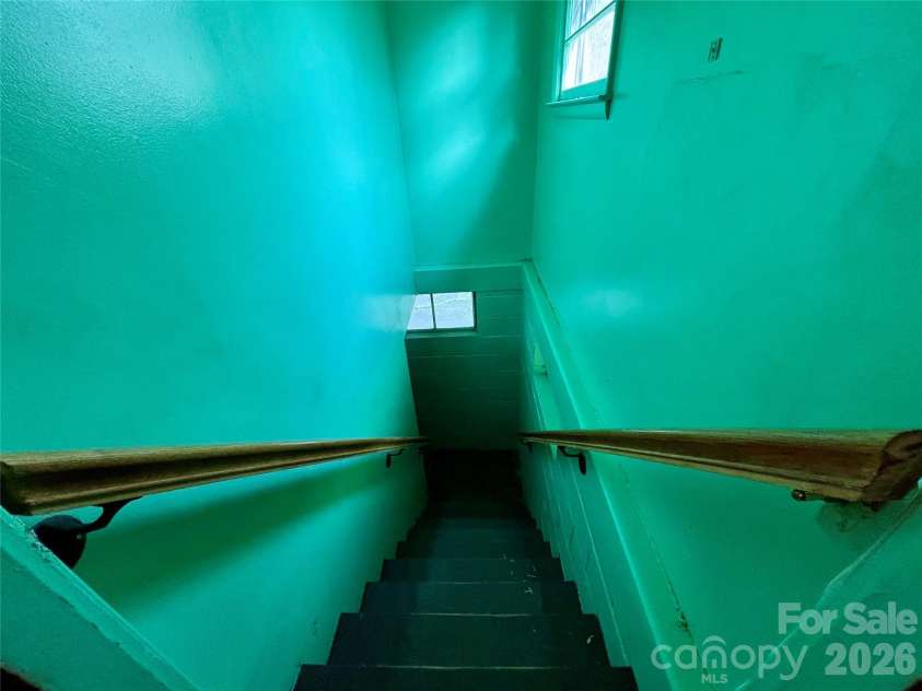 71 Balm Grove Avenue, Asheville, NC 28806.  MLS# CAR4366800, YatesRealty ID 11894. Stairway to Basement