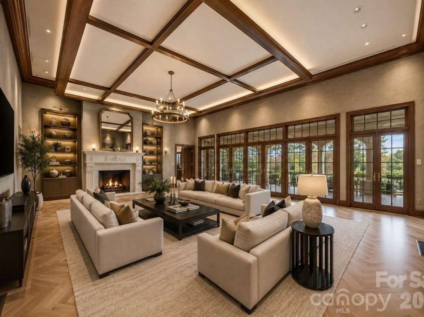 3619 Links Drive, Conover, NC 28613.  MLS# CAR4315421, YatesRealty ID 11899. Elegant great room with soaring ceilings, custom built-ins, and gas log fireplace.