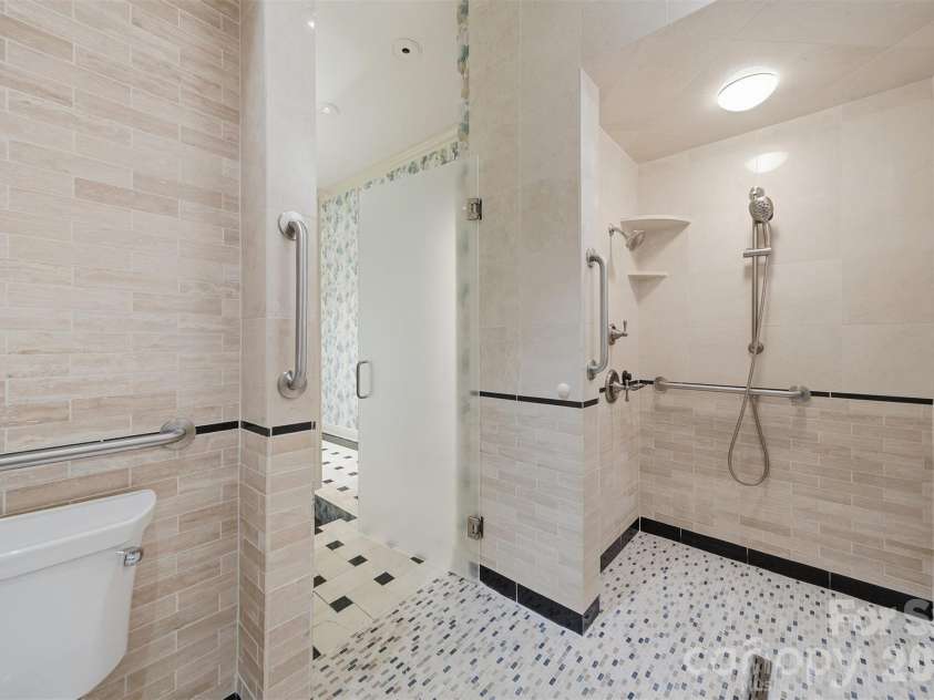 3619 Links Drive, Conover, NC 28613.  MLS# CAR4315421, YatesRealty ID 11899. Oversized walk-in tile shower with glass enclosure and designer finishes