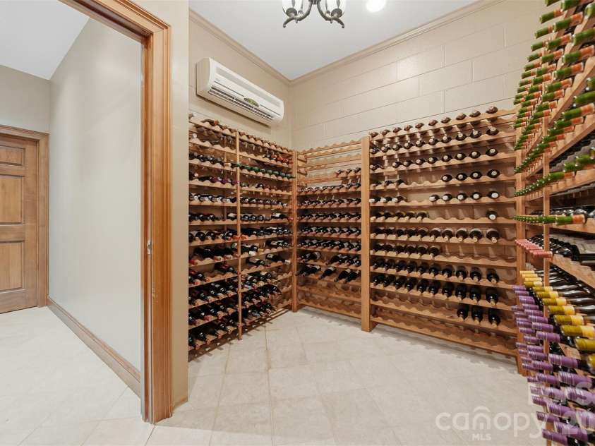 3619 Links Drive, Conover, NC 28613.  MLS# CAR4315421, YatesRealty ID 11899. Temperature-controlled wine cellar ideal for collectors and wine enthusiasts.