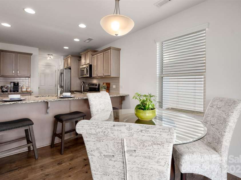 507 Newfound Hollow Drive, Charlotte, NC 28214.  MLS# CAR4252312, YatesRealty ID 11899. Home offers dining area and bar seating