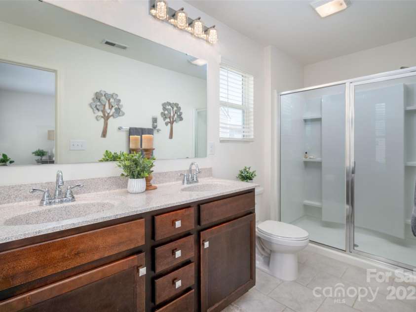 507 Newfound Hollow Drive, Charlotte, NC 28214.  MLS# CAR4252312, YatesRealty ID 11899. Primary bath with shower