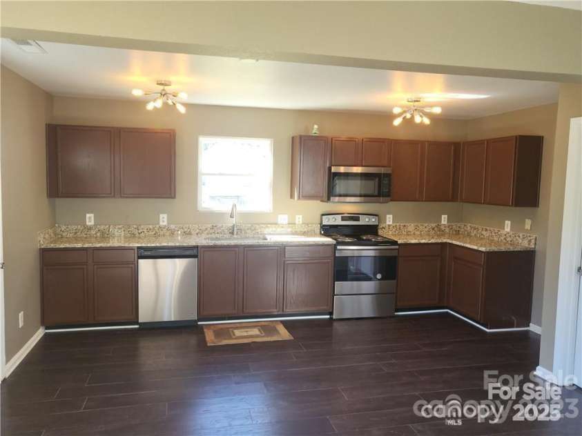 2440 Mint Thistle Court, Charlotte, NC 28269.  MLS# CAR4247951, YatesRealty ID 11901. 