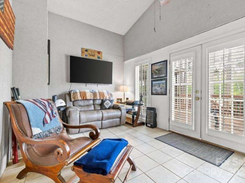 3764 Glenn Oaks Drive, Maiden, NC 28650.  MLS# CAR4246719, YatesRealty ID 11902. Sunroom now used as an office overlooking Golf Course