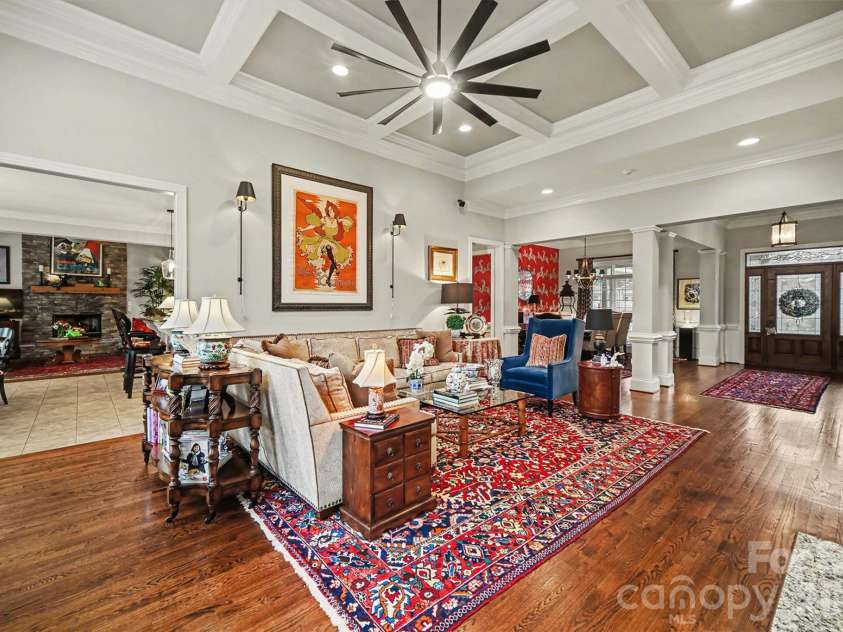 6722 Fox Ridge Circle, Davidson, NC 28036.  MLS# CAR4334663, YatesRealty ID 11905. Living room looks into front entry, dining room and into kitchen, keeping room.
