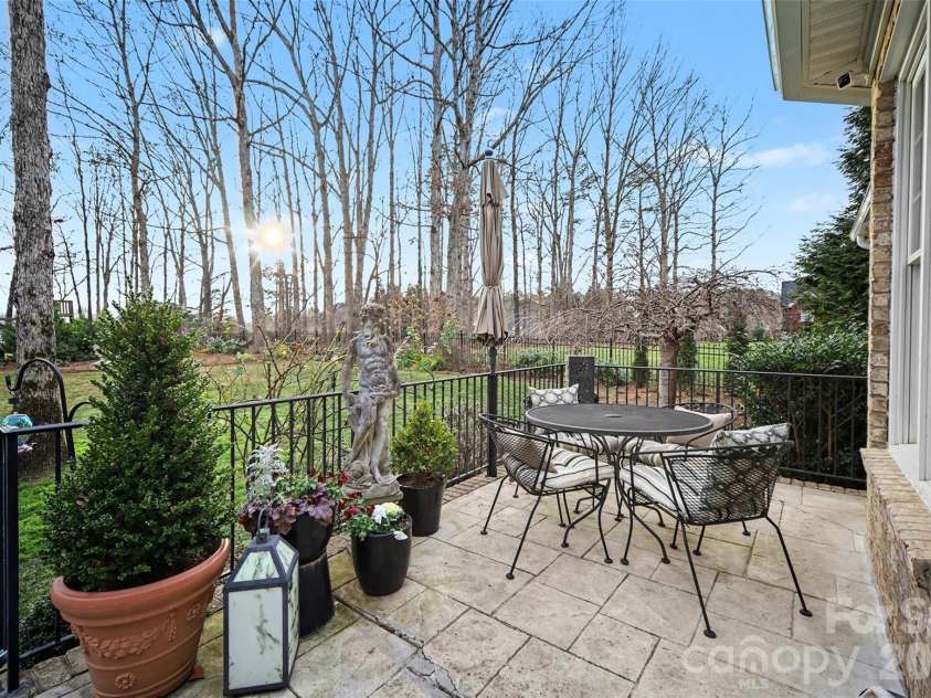 6722 Fox Ridge Circle, Davidson, NC 28036.  MLS# CAR4334663, YatesRealty ID 11905. Spacious back porch for entertaining. 