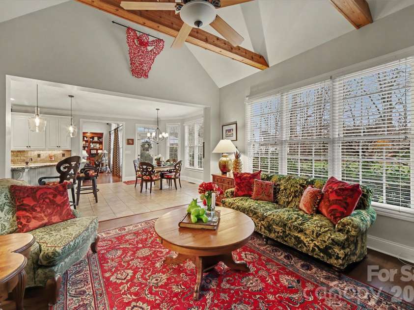 6722 Fox Ridge Circle, Davidson, NC 28036.  MLS# CAR4334663, YatesRealty ID 11905. Windows in Keeping room look out onto back yard.