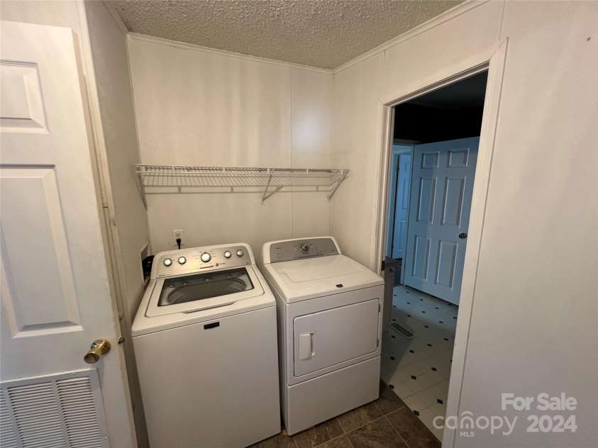 36245 Nugget Road, New London, NC 28127.  MLS# CAR4197702, YatesRealty ID 11909. Laundry room