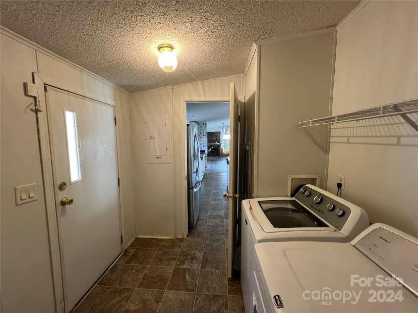 36245 Nugget Road, New London, NC 28127.  MLS# CAR4197702, YatesRealty ID 11909. Laundry room