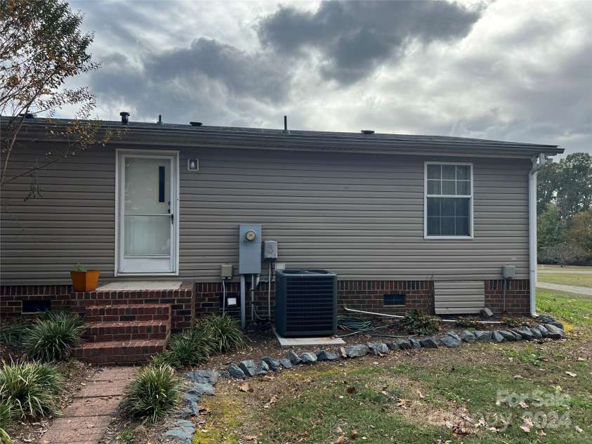 36245 Nugget Road, New London, NC 28127.  MLS# CAR4197702, YatesRealty ID 11909. Rear entrance