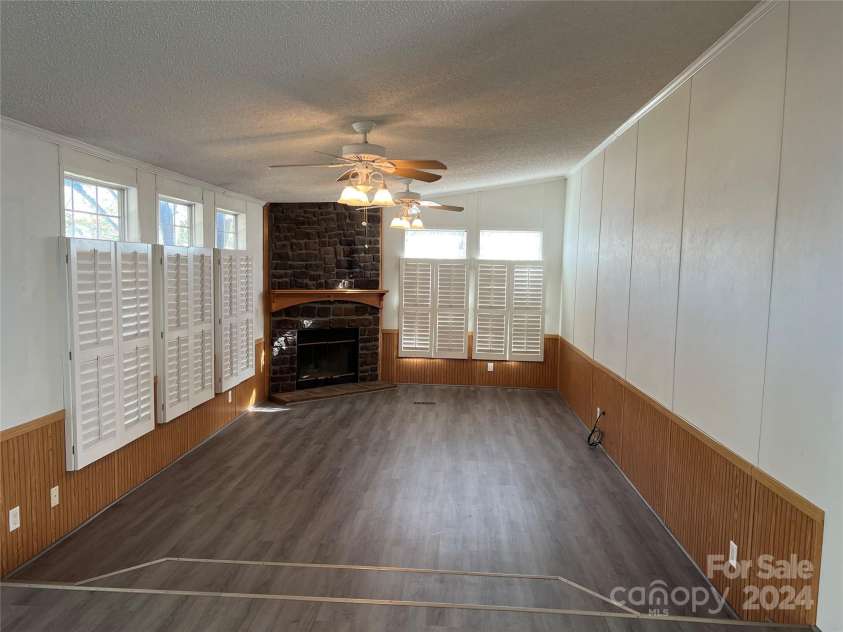36245 Nugget Road, New London, NC 28127.  MLS# CAR4197702, YatesRealty ID 11909. Sunken living room