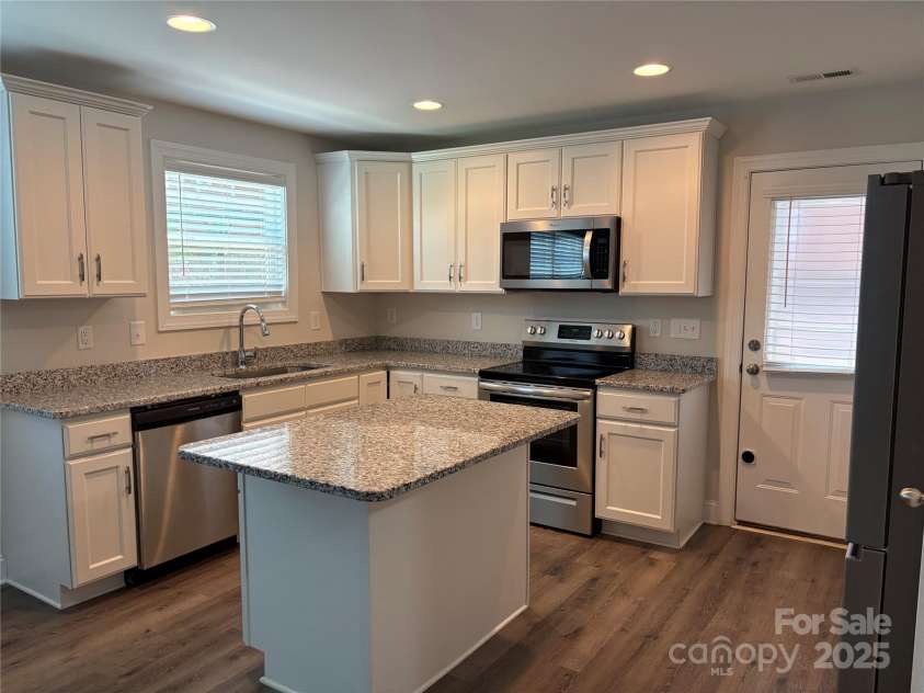 1209 Gaston Avenue, Gastonia, NC 28052.  MLS# CAR4279069, YatesRealty ID 11917. Kitchen Island