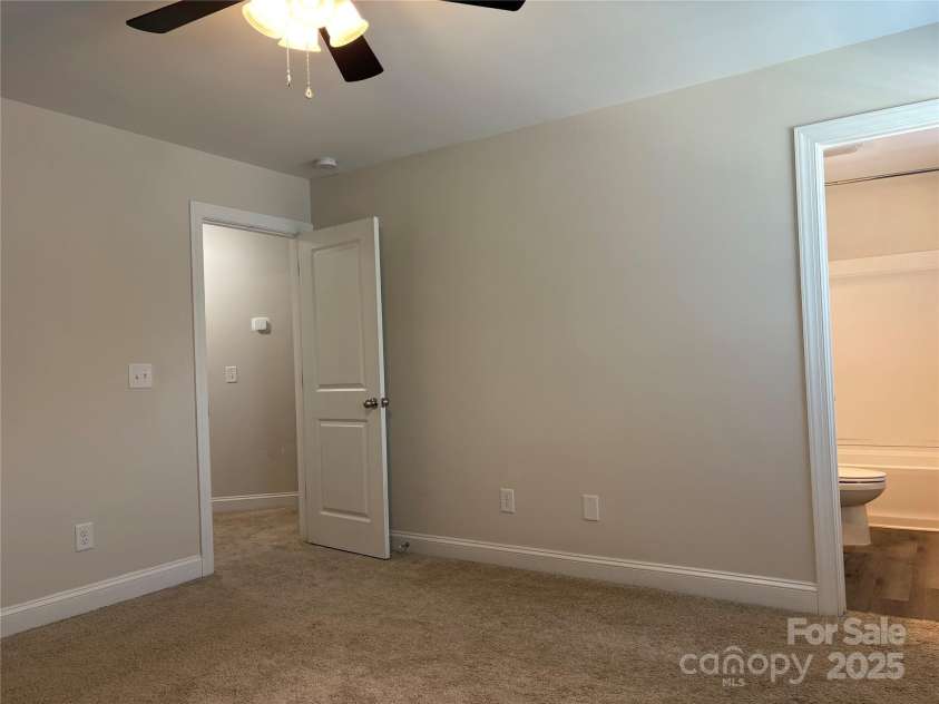 1209 Gaston Avenue, Gastonia, NC 28052.  MLS# CAR4279069, YatesRealty ID 11917. Primary Bedroom w/ ensuite