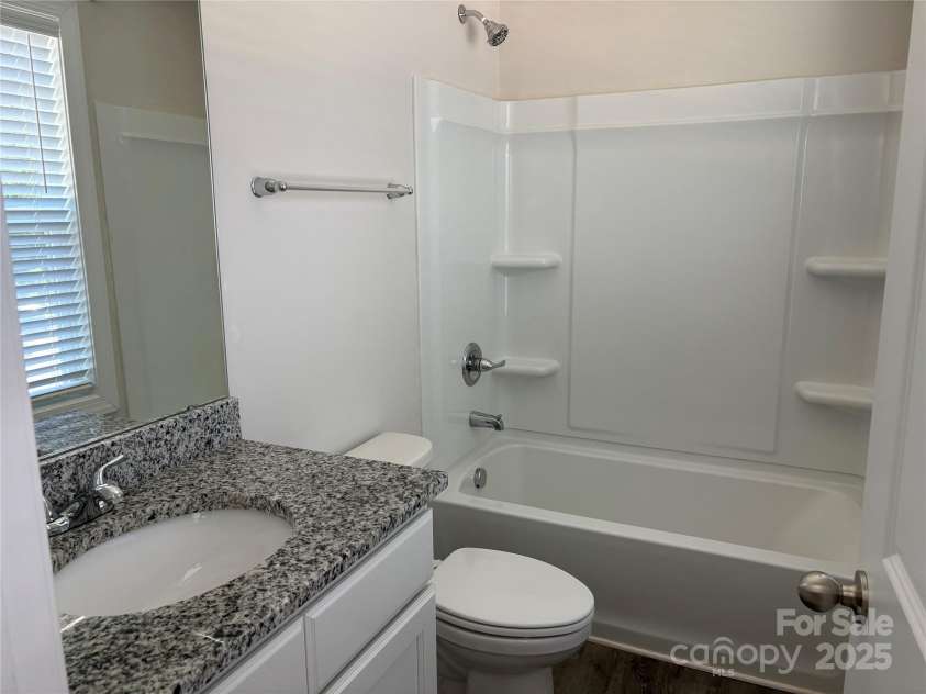 1209 Gaston Avenue, Gastonia, NC 28052.  MLS# CAR4279069, YatesRealty ID 11917. Primary  Full bath upstairs