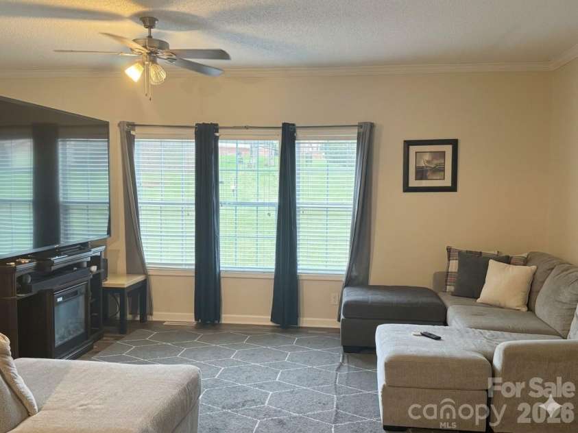 3233 Alamo Drive, Trinity, NC 27370.  MLS# CAR4356868, YatesRealty ID 11918. Living Room - Photo Virtually Edited
