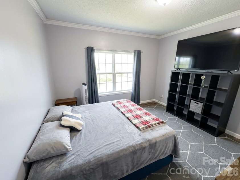 3233 Alamo Drive, Trinity, NC 27370.  MLS# CAR4356868, YatesRealty ID 11918. Primary Bedroom - Photo Virtually Edited