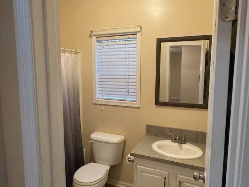 3233 Alamo Drive, Trinity, NC 27370.  MLS# CAR4356868, YatesRealty ID 11918. Secondary Bathroom -Photo Virtually Edited