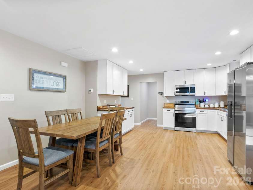 30 Shire Way Lane, Leicester, NC 28748.  MLS# CAR4319147, YatesRealty ID 11924. Dining Area + Kitchen 
