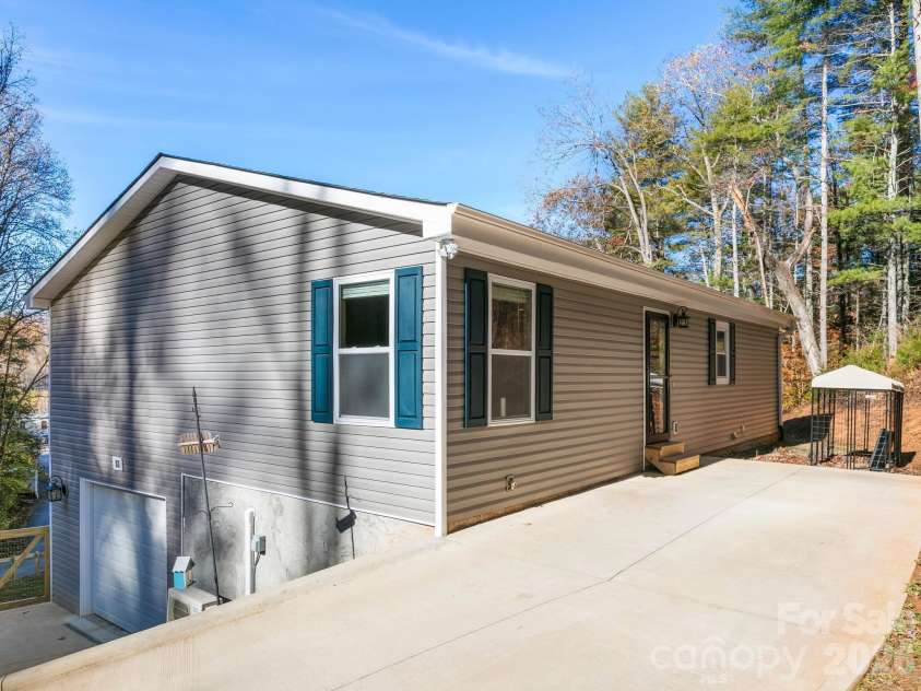 30 Shire Way Lane, Leicester, NC 28748.  MLS# CAR4319147, YatesRealty ID 11924. Front + Side View