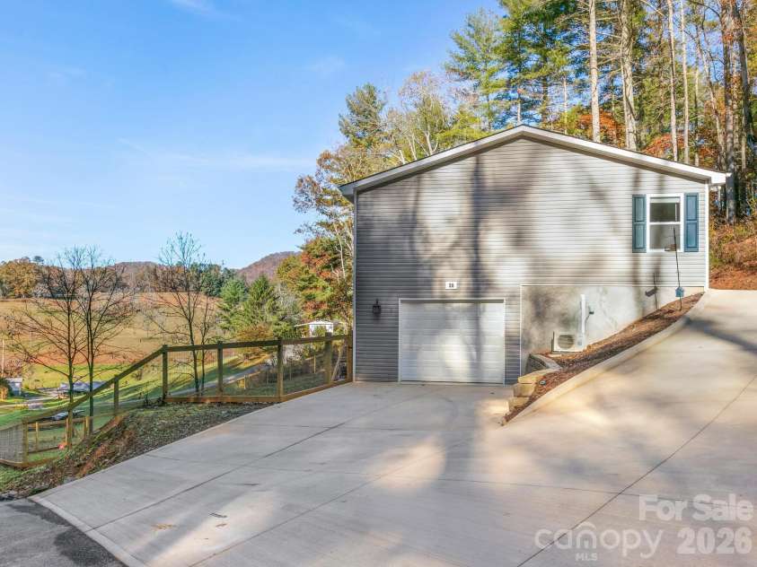 30 Shire Way Lane, Leicester, NC 28748.  MLS# CAR4319147, YatesRealty ID 11924. Side